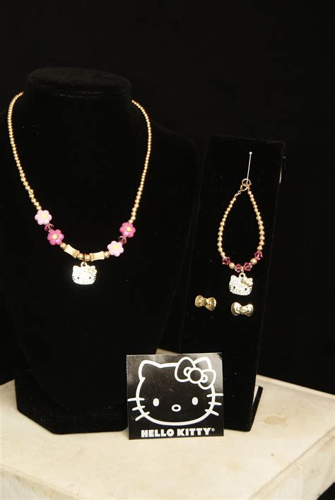 hello kitty rolex necklace